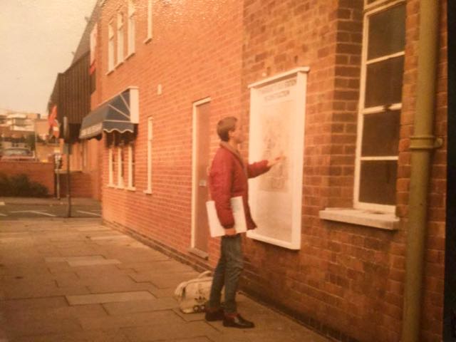 Pete Lawson looking for Leicester bus station on the map while standing in Leicester Bus Station....